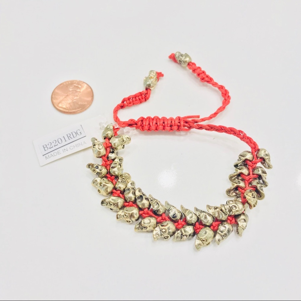 NWT bracelet, multiple bronze skulls & red thread - Picture 6 of 8